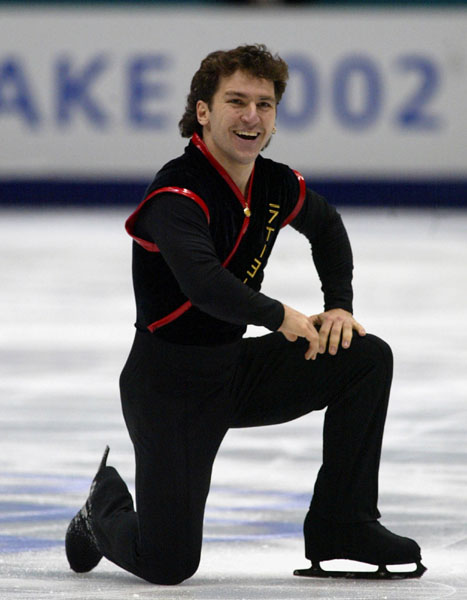 Canadian Figure Skater Elvis Stojko is all smiles after finishing his Mens Short Program in Salt Lake City, Utah Tuesday Feb. 12, at the 2002  Winter Olympic Games. (CP Photo/COA/Andre Forget)