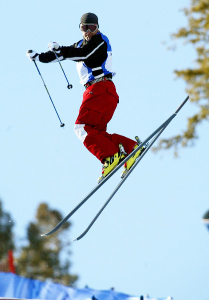 Stephane Rochon of St. Sauveur, Que turns a jump in the qualification round in the men's moguls at the Winter Olympics in Deer Valley, Utah, Tues. Feb. 12, 2002.  Rochon missed a jump in the final and finished fifteenth. (CP Photo/COA/Mike Ridewood)