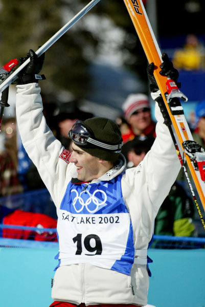 Scott Bellavance, of Prince George, B.C., celebrates as top Canadian at sixth in the men's moguls at the Winter Olympics in Deer Valley, Utah, Tuesday Feb. 12, 2002. (CP PHOTO/COA/Mike Ridewood)