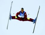 Jean-Luc Brassard, of Grande-Ile, Que., takes a jump in the qualification round in the men's moguls at the Winter Olympics in Deer Valley, Utah, Tuesday Feb. 12, 2002.  Rochon missed the final, finishing twenty-first. (CP Photo/COA/Mike Ridewood)