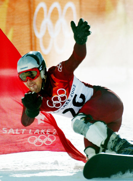 Jerome Sylvestre, of Bromont, Que., races down the slalom course during the men's parallel giant slalom qualifications in Park City, Utah, Thursday Feb. 14, at the 2002 Winter Olympic Games.  Sylvestre went on to qualify for the finals. (CP PHOTO/COA-Andr