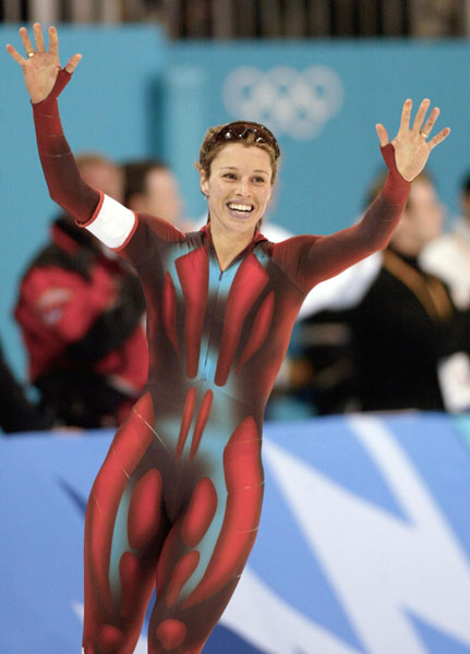 Catriona Le May Doan of Saskatoon celebrates her gold medal run in the women's 500 metre speed skating event at the Winter Olympics in Salt Lake City, Thurs., Feb. 14, 2002. (CP PHOTO/COA-Mike Ridewood)