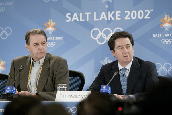 IOC President Jacques Rogge (left) and ISU President Ottavio Cinquanta speak to reporters at a packed press conference at the main media centre of the Winter Olympics in Salt Lake City, Fri., Feb. 15, 2002.  The IOC has decided to award a gold medal to Ca