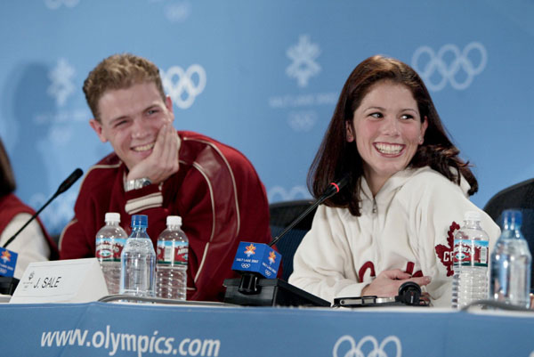 Canadian pairs skaters David Pelletier (left) and Jamie Sale at a press conference after the announcement that the pair would be given a gold medal at the Winter Olympics in Salt Lake City, Fri., Feb. 15, 2002.  (CP PHOTO/COA/Mike Ridewood)