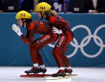 Canadian short track speed skater Tania Vicent (114) pushes off teammate Marie-Eve Drolet (110) during the Women's 3,000 metre heat in Salt Lake City, Utah Saturday Feb. 16, at the 2002 Olympic Winter Games. (CP Photo/COA/Andre Forget).