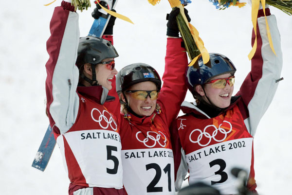 Medalists in women's aerials were, left to right, Veronica Brenner, of Sharon, Ont., silver, Alisa Camplin, of Australia, gold, and Deidre Dionne, of Red Deer, Alta., at Deer Valley, Utah, during the Winter Olympics Monday Feb. 18, 2002.  (CP PHOTO/COA/Mi