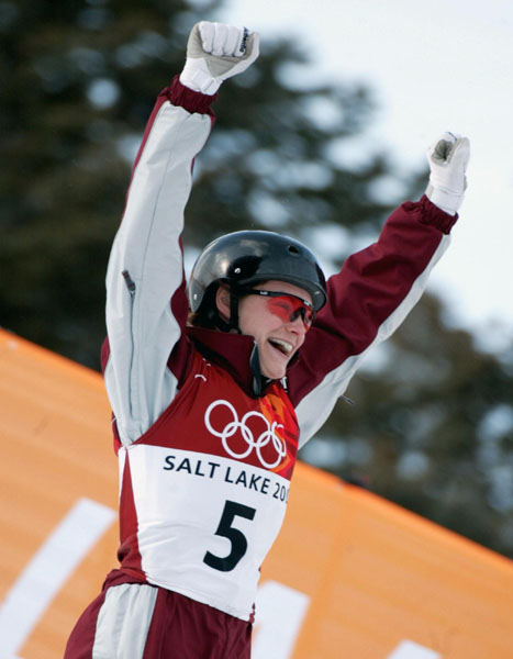 Veronica Brenner of Sharon, Ont., celebrates after landing her second jump and taking the silver medal in women's aerials at Deer Valley, Utah during the Winter Olympics, Mon., Feb. 18, 2002.  (CP PHOTO/COA/Mike Ridewood)
