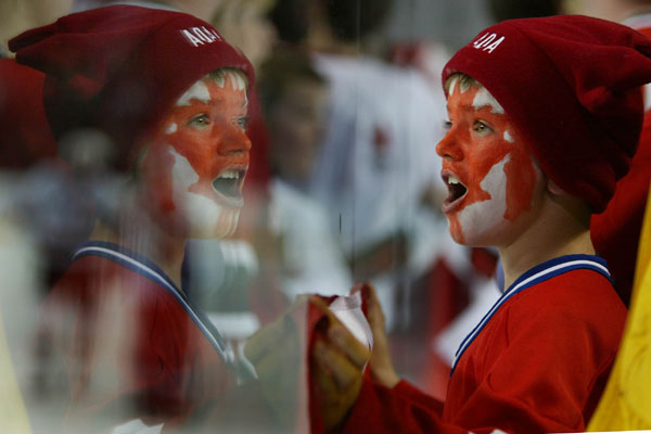 Jamie Chenciner, 9, of Montreal, Canada cheers on Team Canada during a game against the Czech Republic at the 2002 Winter Olympic Games in Salt Lake City. The final score was 3-3. (CP Photo/COA/Andre Forget)