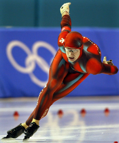 Canadian speed skater Kevin Marshall of Coquitlam, B.C. rounds a corner during the men's 1,500 metre long-track speed skating event Tuesday Feb. 19, 2002 at the 2002 Winter Olympic Games in Salt Lake City. (CP Photo/COA/Andre Forget)