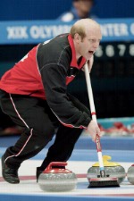 Canadian men's curling skip Kevin Martin tries to place his stone. Canadian Team lost  6 - 5 in the gold medal game against Norway during the 2002 Olympic Winter Games, Ogden, Utah, Friday Feb. 22, 2002 . (CP PHOTO/COA/Mike Ridewood).