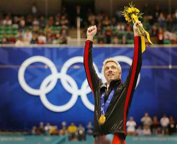 Canadian short track gold medalist  Marc Gagnon raises his arms after being awarded the gold medal in the men's 500 metre Saturday Feb. 23, 2002 at the 2002 Winter Olympic Games in Salt Lake City. He also won gold for the men's 5,000 metre relay. (CP Phot