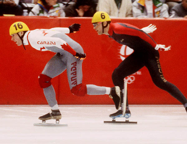 Canada's Mark Lackie (left) competes in the short track speed skating event at the 1992 Albertville Olympic winter Games. (CP PHOTO/COA/Ted Grant)