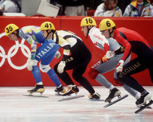 Canada's Mark Lackie (second from right) competes in the short track speed skating event at the 1992 Albertville Olympic winter Games. (CP PHOTO/COA/Ted Grant)