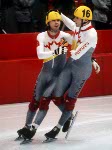 Canada's Frederic Blackburn (left) and Mark Lackie  compete in the short track speed skating event at the 1992 Albertville Olympic winter Games. (CP PHOTO/COA/Ted Grant)