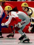 Canada's Annie Perreault (left) competes in the short track speed skating event at the 1992 Albertville Olympic winter Games. (CP PHOTO/COA/Ted Grant)