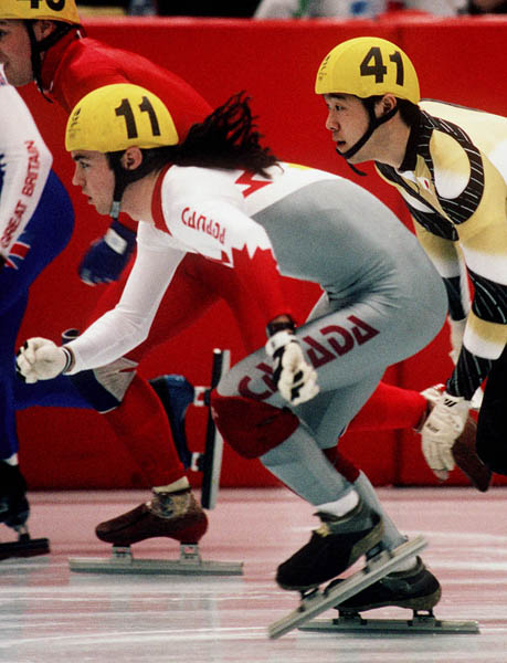 Canada's Frederic Blackburn (11) competes in the short track speed skating event at the 1992 Albertville Olympic winter Games. (CP PHOTO/COA/Ted Grant)