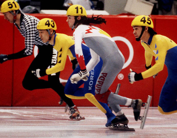 Canada's Frederic Blackburn (11) competes in the short track speed skating event at the 1992 Albertville Olympic winter Games. (CP PHOTO/COA/Ted Grant)