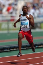 Canadian sprinter Pierre Brown of Toronto, Ontario, crossed the line with a time of 10.32 in the 100m heat at the 2004 Summer Olympic Games in Athens on Saturday, August 21, 2004 and moved on. (CP PHOTO/COC-Andre Forget)