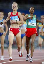 Canada's Carmen Douma-Hussar of Cambridge, Ont. advanced to the semi-final in women's 1500 metre heats in track and field action at the Athens Olympics, Tuesday, August 24, 2004.(CP PHOTO)2004(COC-Mike Ridewood)