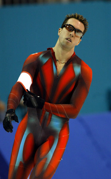 Canadian long-track speed skater Eric Brisson races during his 500-metre heat in Salt Lake City, Utah Tuesday Feb. 12, at the 2002 Olympic Winter Games. (CP Photo/COA/Andre Forget).
