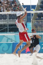 Canada's Mark Heese (left)  and John Child (right)   in action during a beach volleyball tournament  at the Sydney 2000 Olympic Games. (CP PHOTO/ COA)