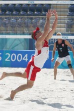 Canada's Mark Heese (left) and John Child (right)  in action during a beach volleyball tournament  at the Sydney 2000 Olympic Games. (CP PHOTO/ COA)