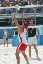 Canada's Mark Heese (left) and John Child (right)  in action during a beach volleyball tournament  at the Sydney 2000 Olympic Games. (CP PHOTO/ COA)