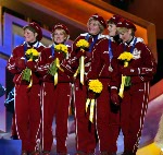 Canadian Womens Curling team (left to right)  Cheryl Noble, of Victoria, Kelley Law, of Coquitlam, B.C., Diane Nelson, of Burnaby, B.C., Julie Skinner, of Victoria, and Georgina Wheatcroft, of Victoria, show off their bronze medals Thursday Feb. 21, 2002,