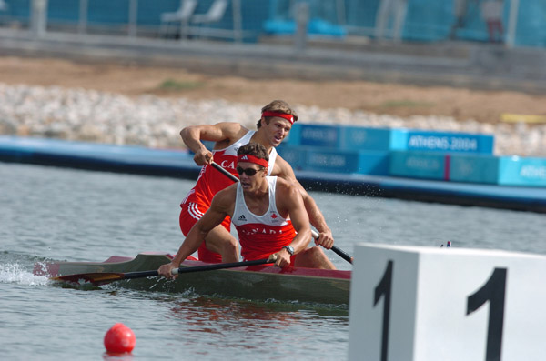 Canada's Richard Dalton (front) of Halifax, Nova Scotia and Michael Scarola of Waverley, Nova Scotia, after crossing the finish line in the K2 1000m final during the Athens 2004 Summer Olympic Games Tuesday Friday August 27, 2004. The pair finished in sixth place. (CP PHOTO/COC-Andre Forget)