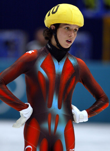Marie-Eve Drolet (110) catches her breath after the 1000 m at the 2002 Olympic Winter Games in Salt Lake City. (CP Photo/COA/Andre Forget).