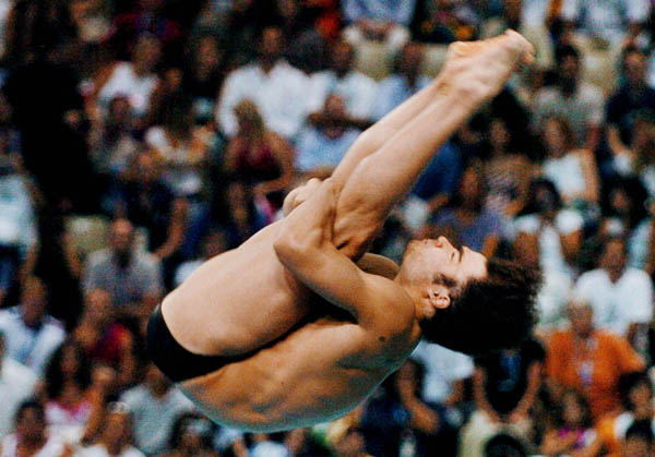 Alexandre Despatie of Montreal performs the mens 3m springboard during the Athens 2004 Summer Olympic Games Tuesday, August 24, 2004. Despatie went on to win silver. (CP PHOTO/COC-Andre Forget)