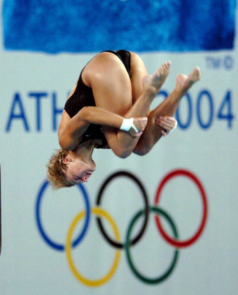 Emilie Heymans of Canada dives during training prior to the Athens 2004 Summer Olympic Games August 12, 2004. (CP PHOTO 2004/Andre Forget/COC)