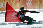 Jasey-Jay Anderson races down the slalom course during the men's parallel giant slalom qualifications in Park City, Utah, Thursday Feb. 14, at the 2002 Olympic Winter Games in Salt Lake City. Anderson failed to qualify. (CP PHOTO/COA/Andre Forget).