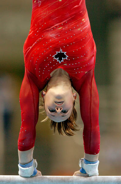 Kate Richardson of Canada flies over the vault during women's gymnastics qualifications at the 2004 Olympic Games in Athens, Sunday, Aug. 15, 2004. (CP PHOTO/COC-Andre Forget)
