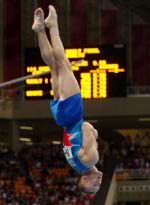 Kyle Shewfelt of Calgary performs during the men's vault final at the 2004 Summer Olympic Games in Athens, Greece, Monday, August 23, 2004. Shewfelt came in fourth. (CP PHOTO/COC/Andre Forget)