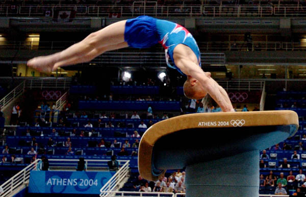 Kyle Shewfelt of Calgary performs during the men's vault final at the 2004 Summer Olympic Games in Athens, Greece, Monday, August 23, 2004. Shewfelt came in fourth. (CP PHOTO/COC/Andre Forget)