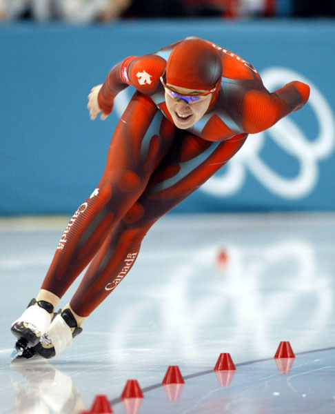 Clara Hughes skates to the bronze medal in the women's 5,000 metre long track speed skating race at the 2002 Olympic Winter Games in Salt Lake City, Utah, Sat., Feb. 23, 2002 . (CP PHOTO/COA/Mike Ridewood).