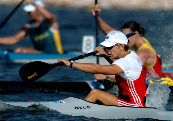 Canada's Caroline Brunet of Montreal, Quebec races in the K1 500m heat during the Athens 2004 Summer Olympic Games Tuesday August 24, 2004. Brunet placed first in the heat. (CP PHOTO/COC-Andre Forget)