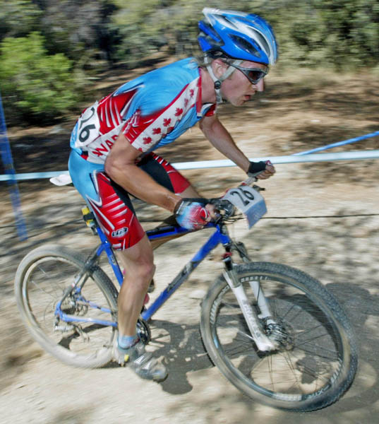 Seamus McGrath of Carlisle, Ont., rides to a ninth place in the men's mountain bike event at the Athens Olympics, Saturday, August 28, 2004.(CP PHOTO/COC-Mike Ridewood)