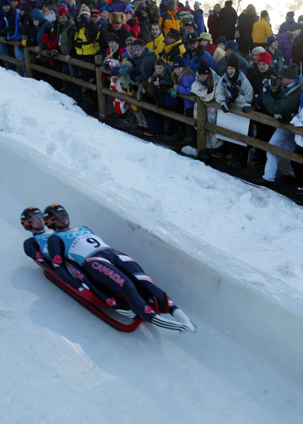Canadian Doubles Luge team Chris Moffat and Eric Pothier race down the track at the Utah Olympic Park in Park City, Utah Friday Feb. 15, at the 2002 Olympic Winter Games. (CP Photo/COA/ Andre Forget).