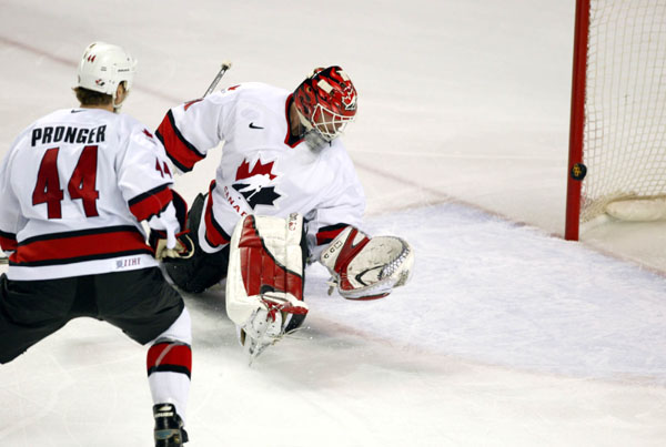 Canada's Chris Pronger and goalie Martin Brodeur in action against Belarus in the semifinal at the 2002 Olympic Winter Games in Salt Lake City. (CP PHOTO/COA/Andr Forget).