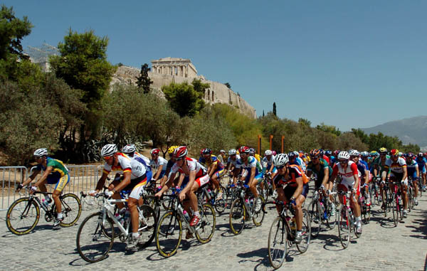 Cyclists race past the Acropolis during the road race of the Athens 2004 Summer Olympic Games  Saturday August 14, 2004. (CP PHOTO/COC-Andre Forget)