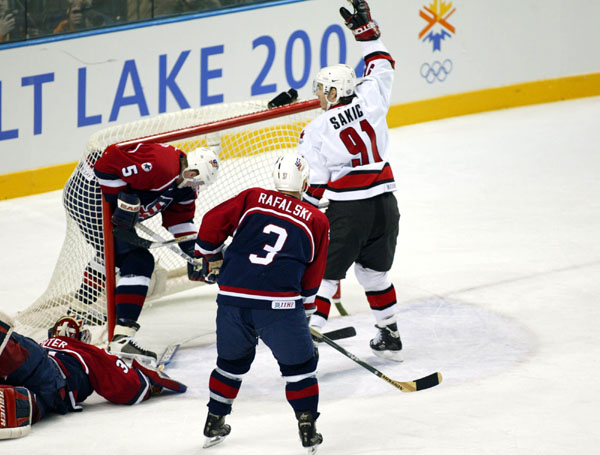 Joe Sakic (91) celebrates a score during the final against Team USA at the 2002 Olympic Winter Games in Salt Lake City. Team Canada won 5-2 over Team USA for the gold. (CP Photo/COA/Andre Forget).