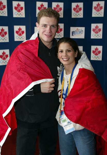 Pairs figure skaters Jamie Sal and David Pelletier pose for pictures after it was announced that they will carry the Canadian flag into the closing cermonies at the 2002 Olympic Winter Games in Salt Lake City, Utah, Sat., Feb. 23, 2002 . (CP PHOTO/COA/Mike Ridewood).