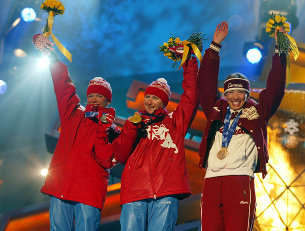 Canadian Beckie Scott receives her bronze medal for women's 5km Free Pursuit Salt Lake City, Utah Friday Feb. 15, at the 2002 Olympic Winter Games in Salt Lake City. (CP Photo/COA/Andre Forget).
