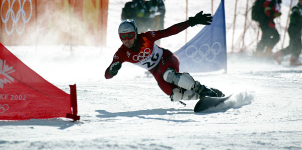 Jrome Sylvestre races down the slalom course during the men's parallel giant slalom qualifications in Park City, Utah, Thursday Feb. 14, at the 2002 Olympic Winter Games in Salt Lake City. Sylvestre was sole canadian to qualify. (CP PHOTO/COA/Andre Forget).