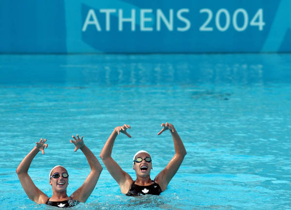 Canadian Scynco team member's Fanny Letourneau and Courtenay Stewart practice prior to the Athens 2004 Summer Olympic Games August 10, 2004 in Greece. (CP PHOTO 2004/Andre Forget/COC)