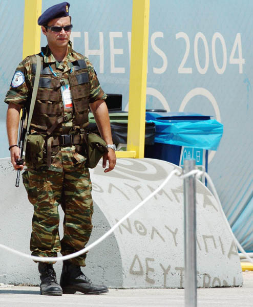A Greek soldier stands guard prior to the the Athens, Greece 2004 Summer Olympic Games on Wednesday Aug. 11, 2004. (CP PHOTO 2004/Andre Forget/COC)