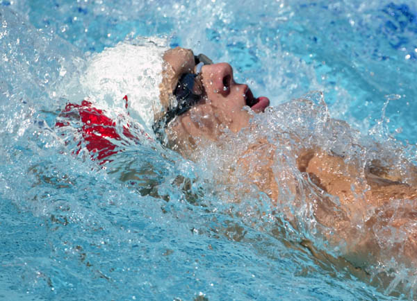 Keith Beavers of Kitchener, Ont. in 200 metre backstroke in swimming preliminaries action at the Athens Olympics, Wedsday, August 18, 2004.  (CP PHOTO)2004(COC-Mike Ridewood)