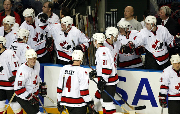 Team Canada during the final game against USA. Team Canada won the gold medal (5-2) over Team USA Sunday Feb. 24, 2002 at the 2002 Olympic Winter Games in West Valley, Utah.  (CP Photo/COA/Mike Ridewood).